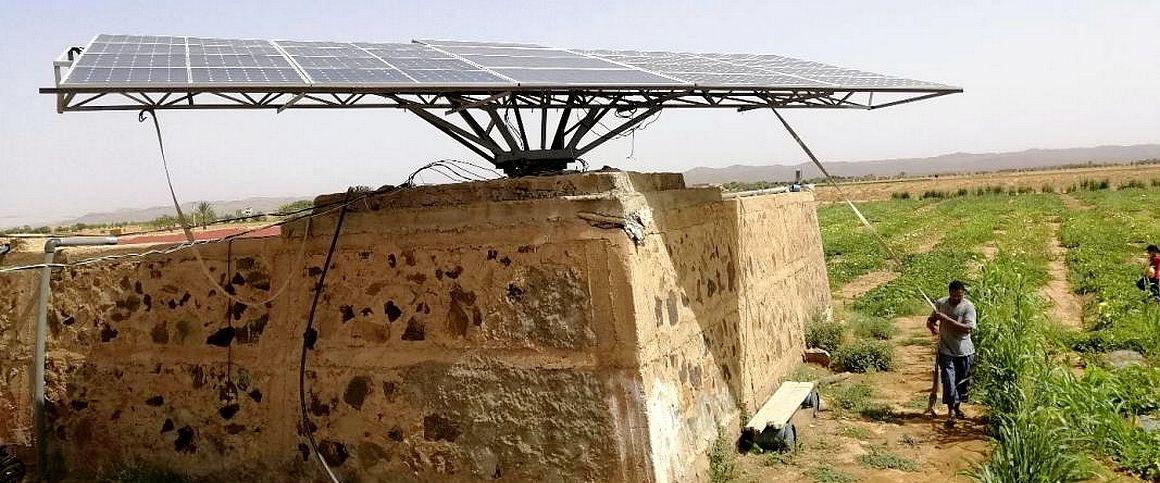 Solar panel powering irrigation in Tinghire, Morocco. The farmer turns the panel (to follow the sun) to increase its operating time during the day © F. Hamamouche, CIRAD