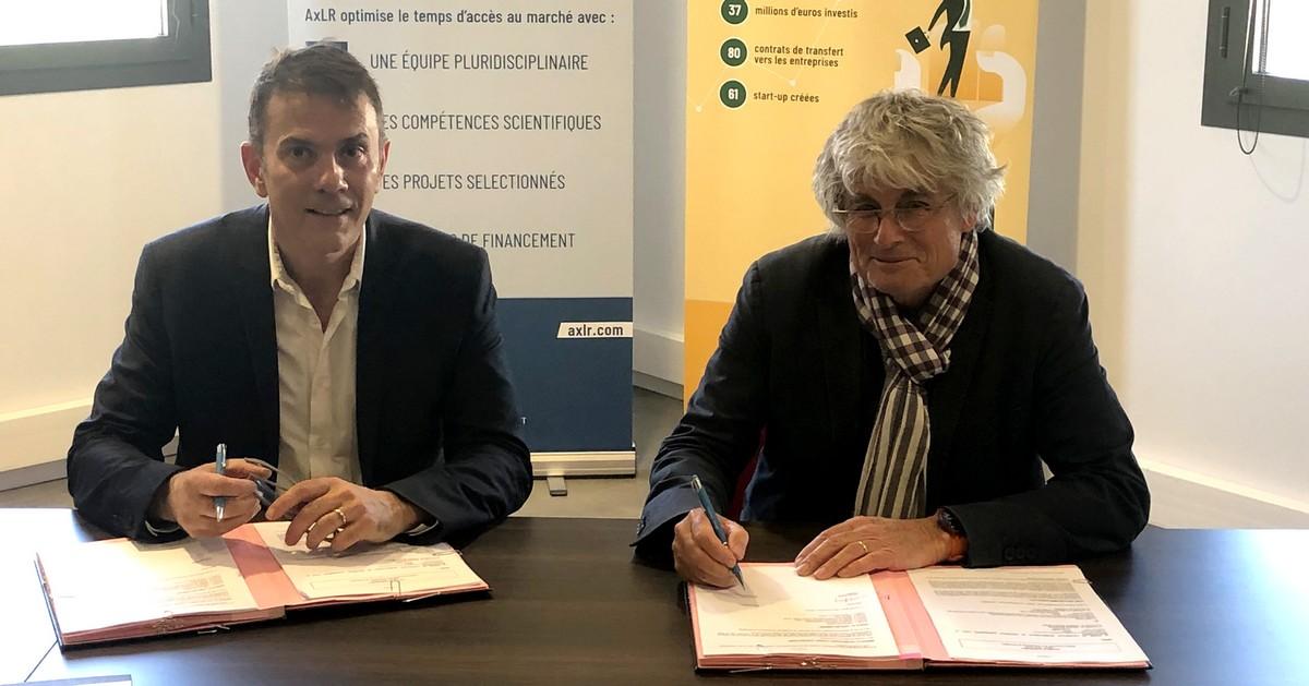 Michel Eddi, PDG du Cirad et Philippe Nérin, PDG de SATT AxLR ont signé un accord de partenariat le 13 mai 2019. © SATT AxLR