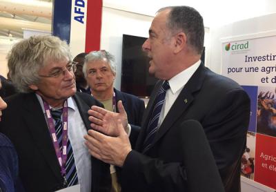 CIRAD President Managing Director Michel Eddi and French Minister of Agriculture Didier Guillaume on the CIRAD-AFD stand  © CIRAD, F. Causse